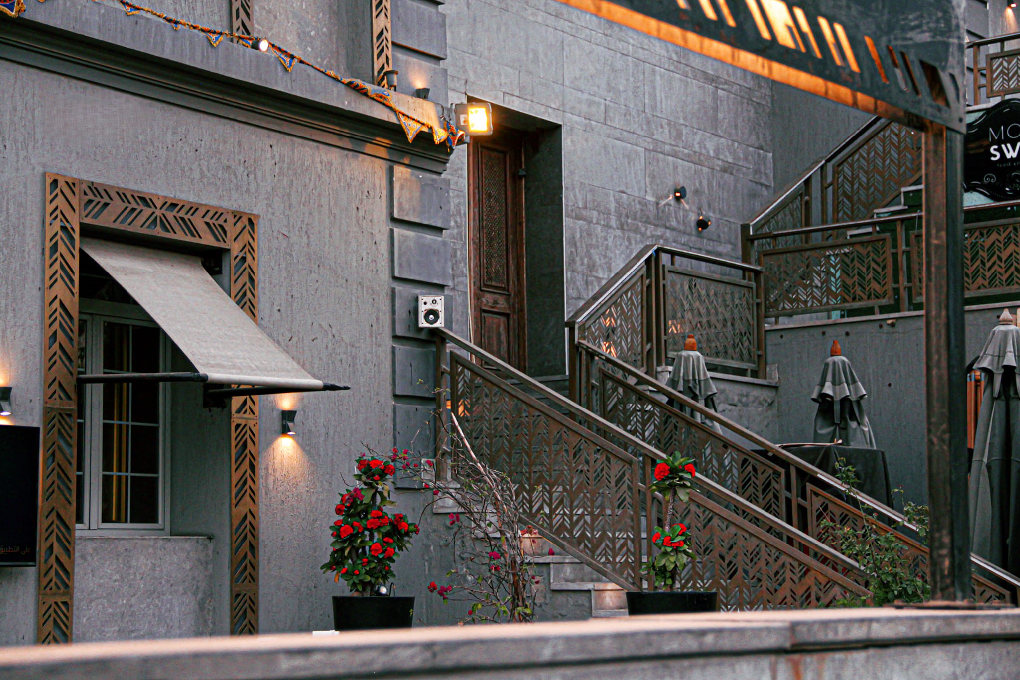 Grey house with stairs